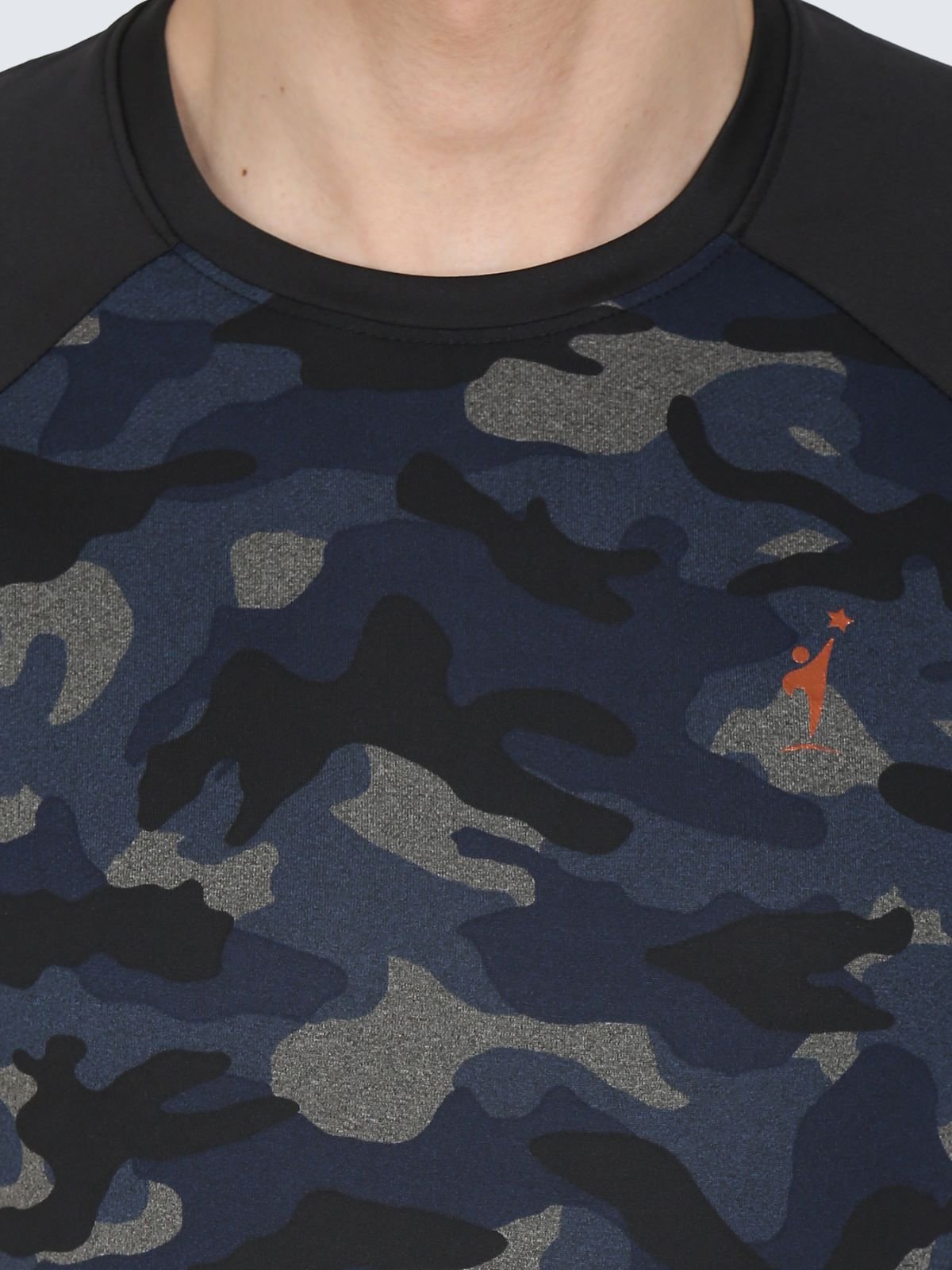 Close-up of navy camo raglan T-shirt showing round neck, pattern and chest NDR SPORT logo