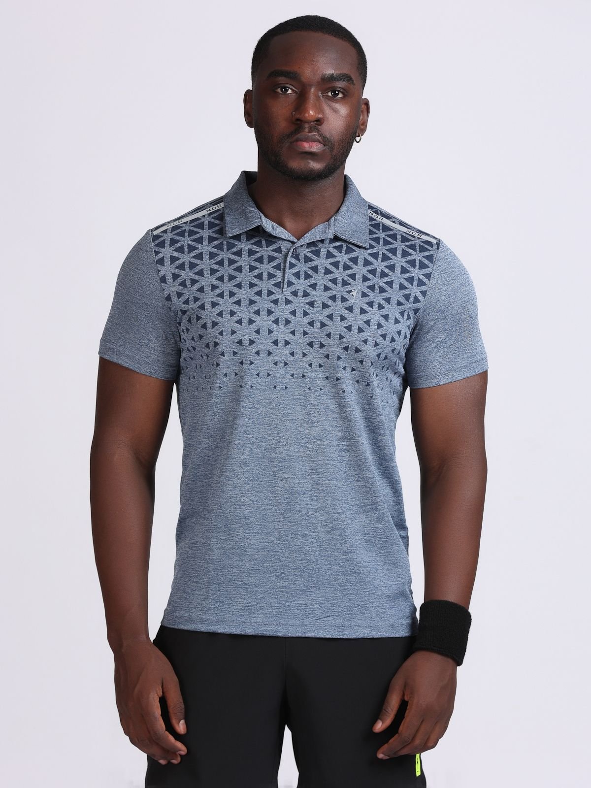 Male model wearing light grey geometric-print polo T-shirt Milanz Illustrated, front view