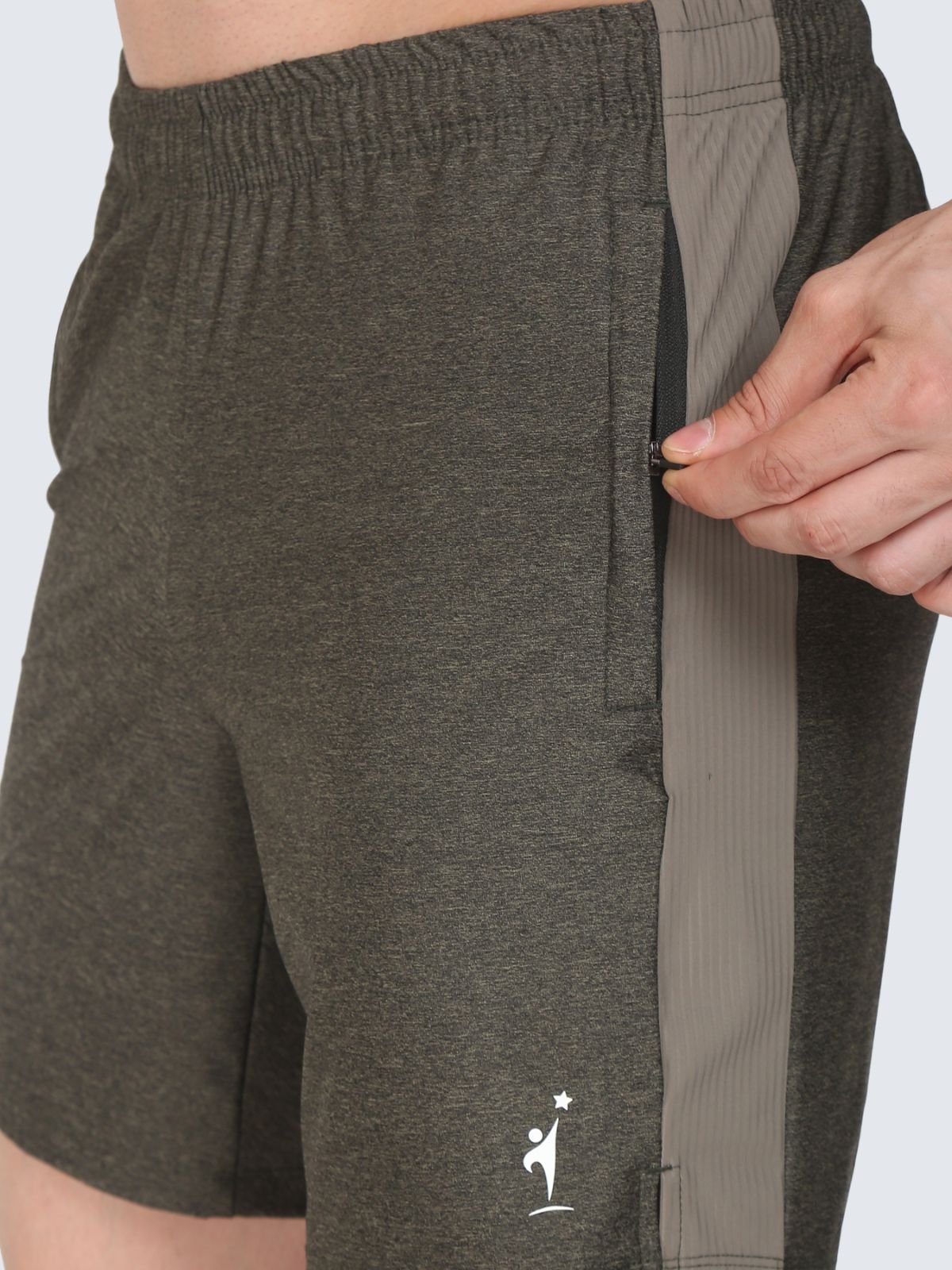 Close-up of olive Regular Strips shorts showing zip pocket, darker side panel and NDR SPORT logo