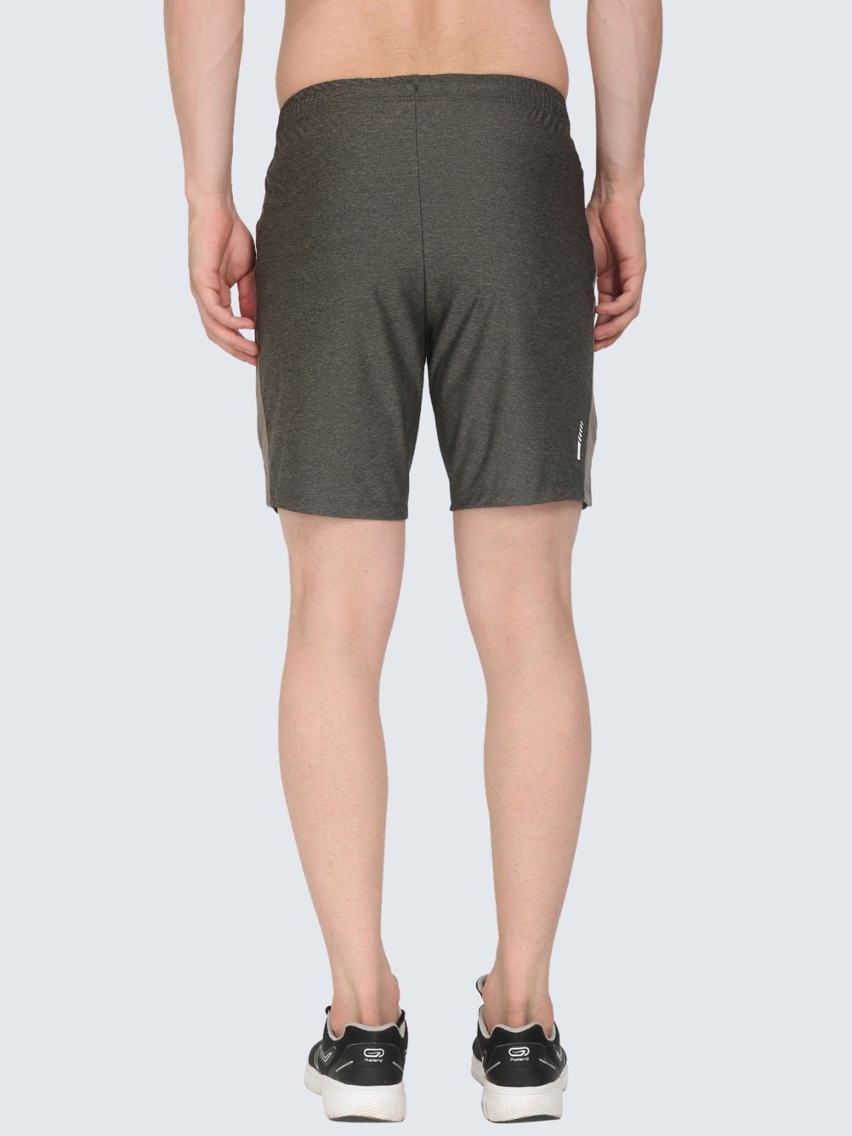 Back view of olive athletic shorts on a white background