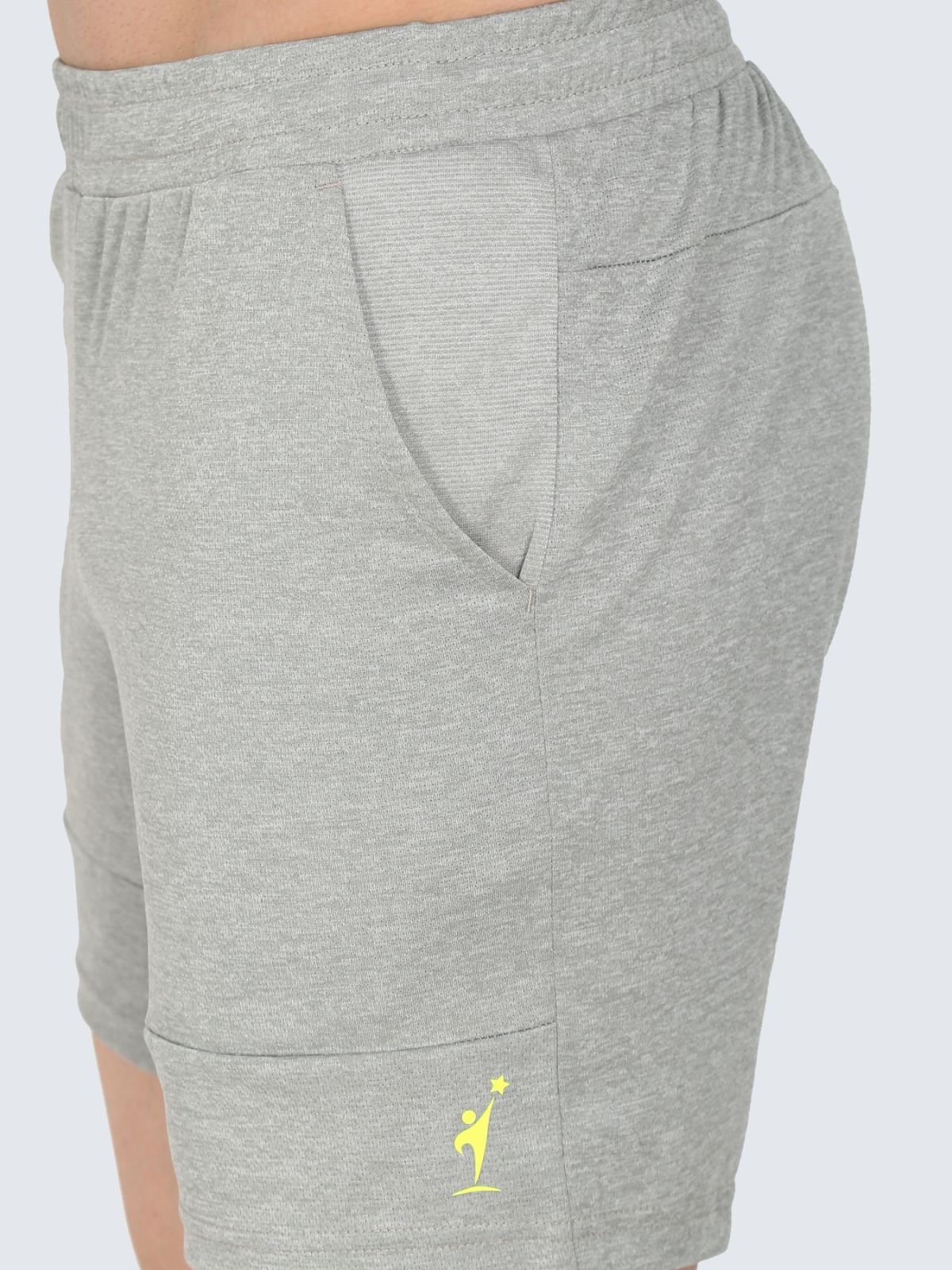 Close-up of heather grey Reversible shorts showing side pocket detail and NDR SPORT logo