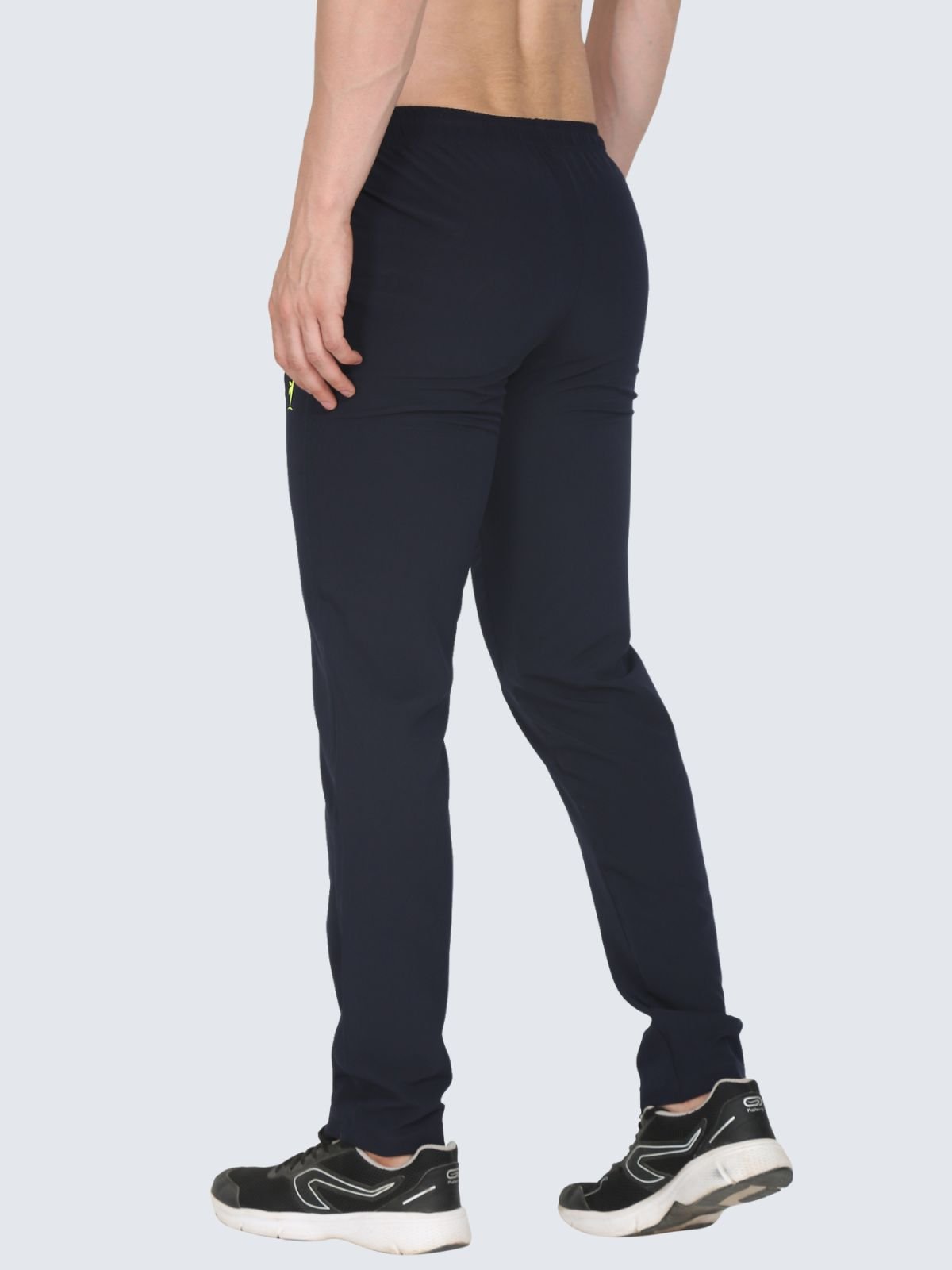 Back three-quarter view of Lite Plain navy athletic pants on a white background