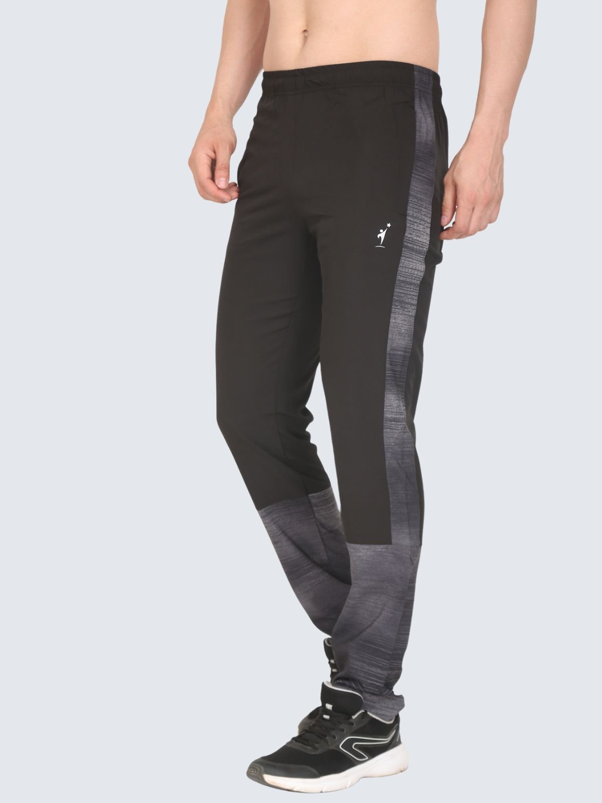 Three-quarter side view of Lite Subly black athletic pants with grey gradient side and lower panels on a white background with NDR SPORT logo